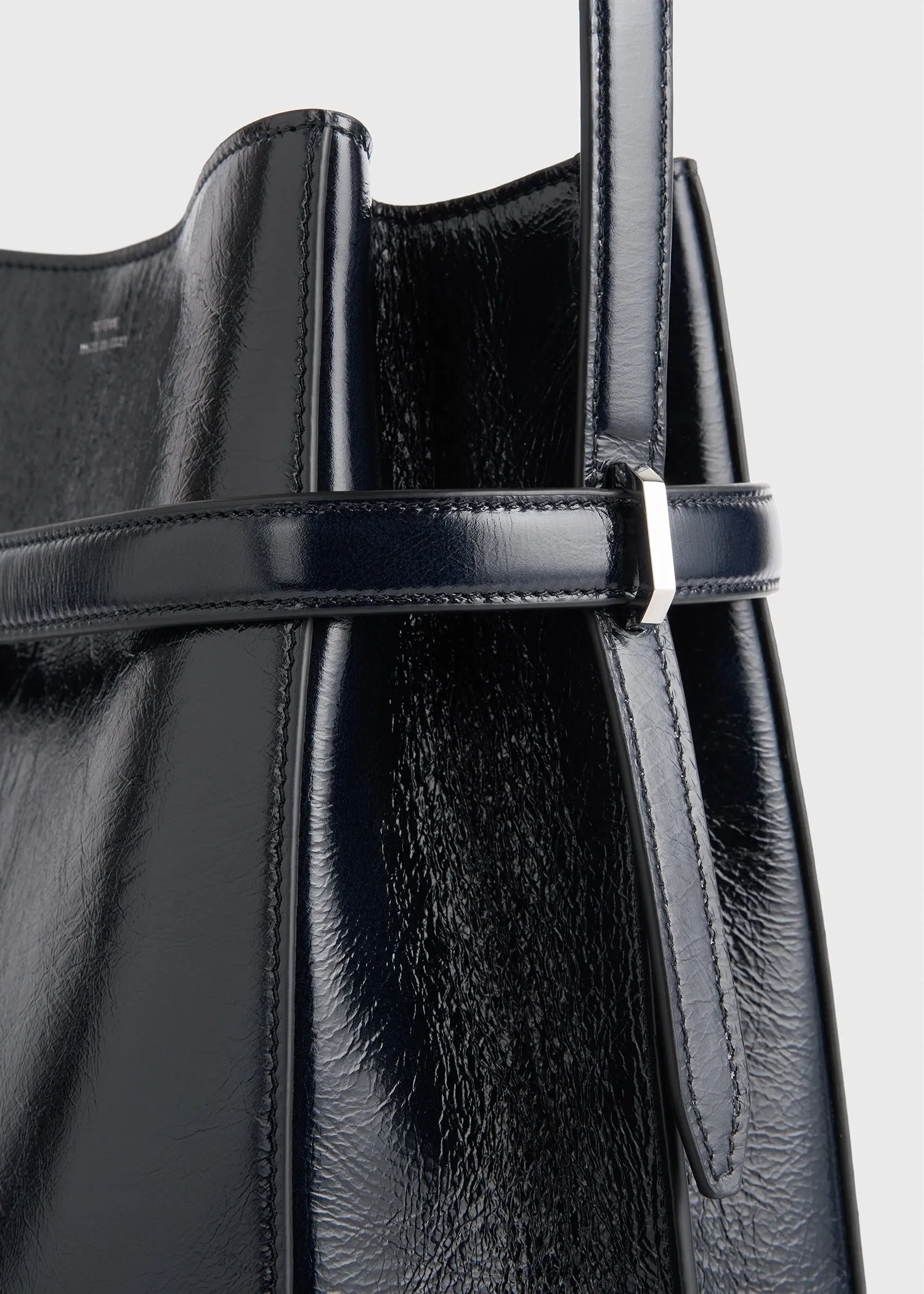 Belted naplack-leather bucket bag navy