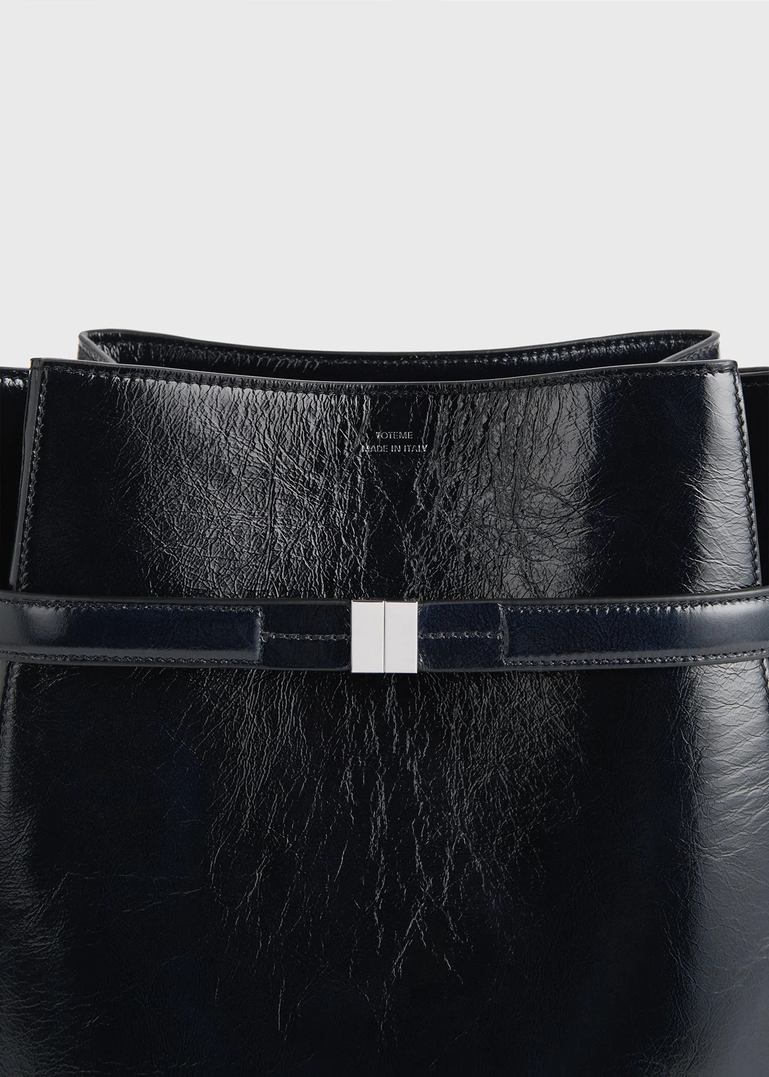 Belted naplack-leather bucket bag navy