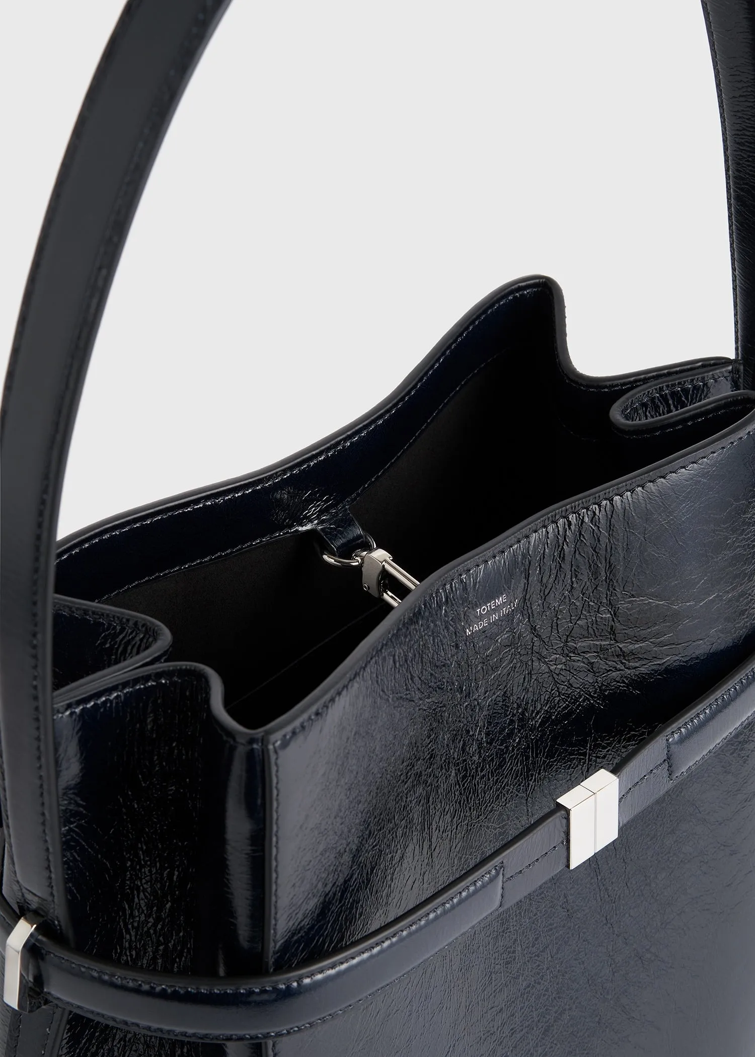 Belted naplack-leather bucket bag navy