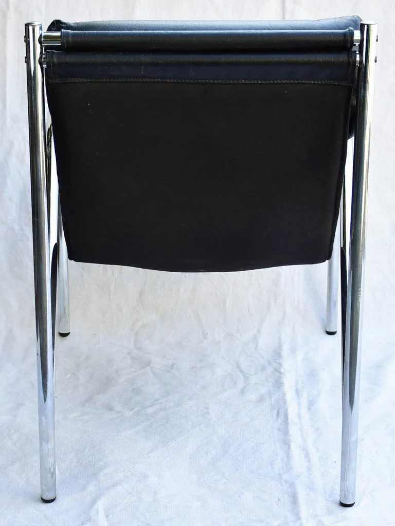 Pair of 1950's black leather and chrome armchairs in the style of Le Corbusier Charlotte Perriand