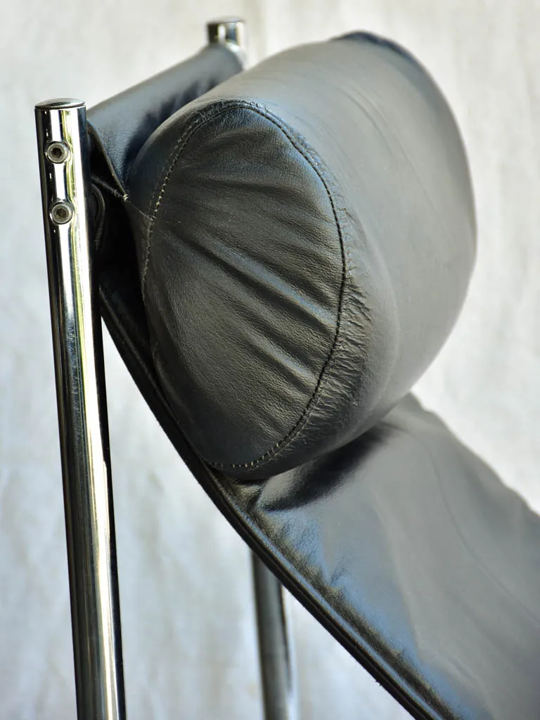 Pair of 1950's black leather and chrome armchairs in the style of Le Corbusier Charlotte Perriand