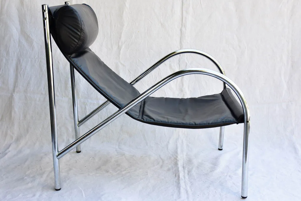 Pair of 1950's black leather and chrome armchairs in the style of Le Corbusier Charlotte Perriand