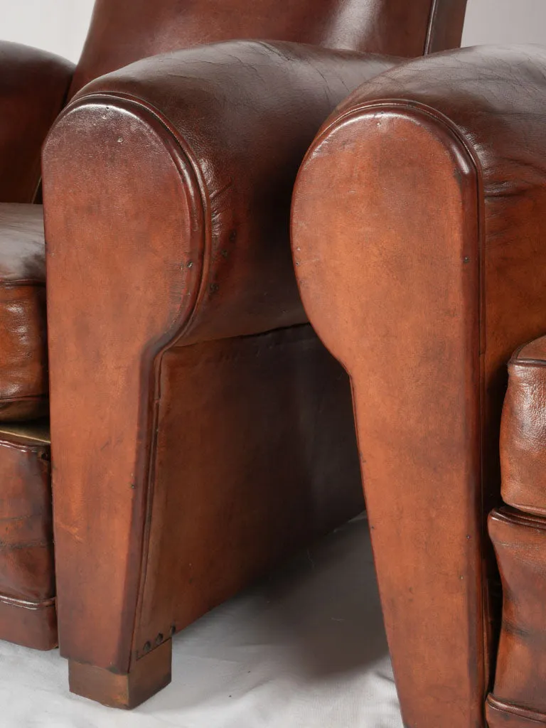 Pair of antique French leather club chairs - moustache back