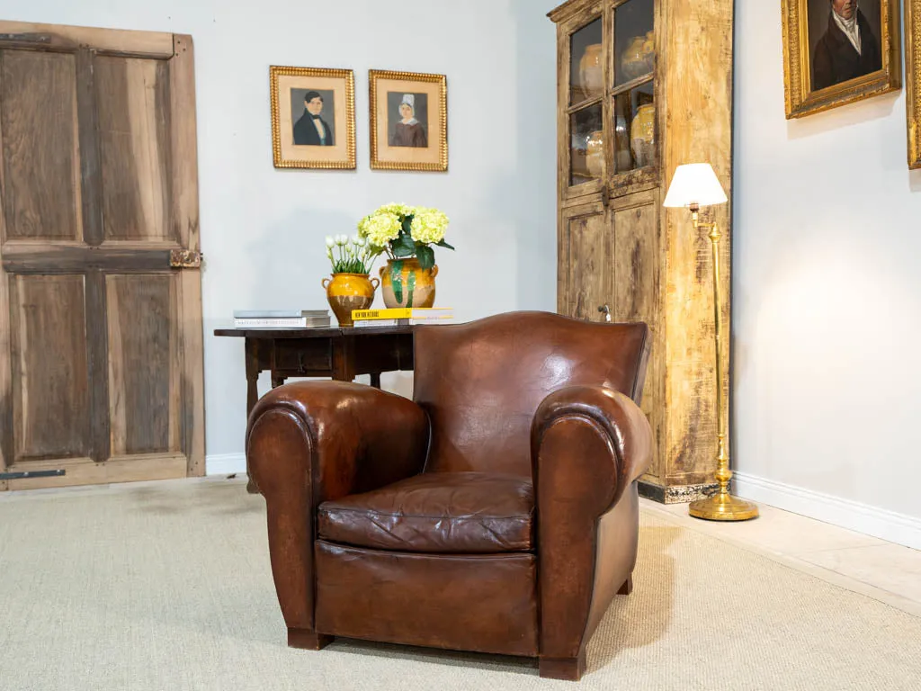 Pair of restored antique French leather club chairs