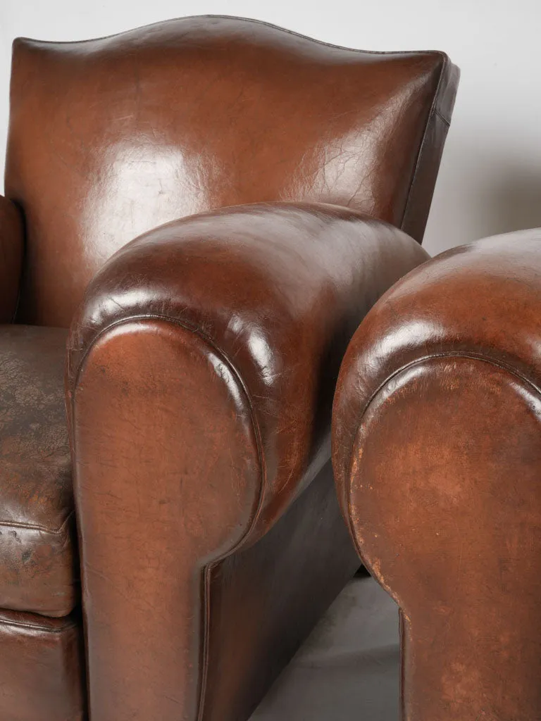 Pair of restored antique French leather club chairs