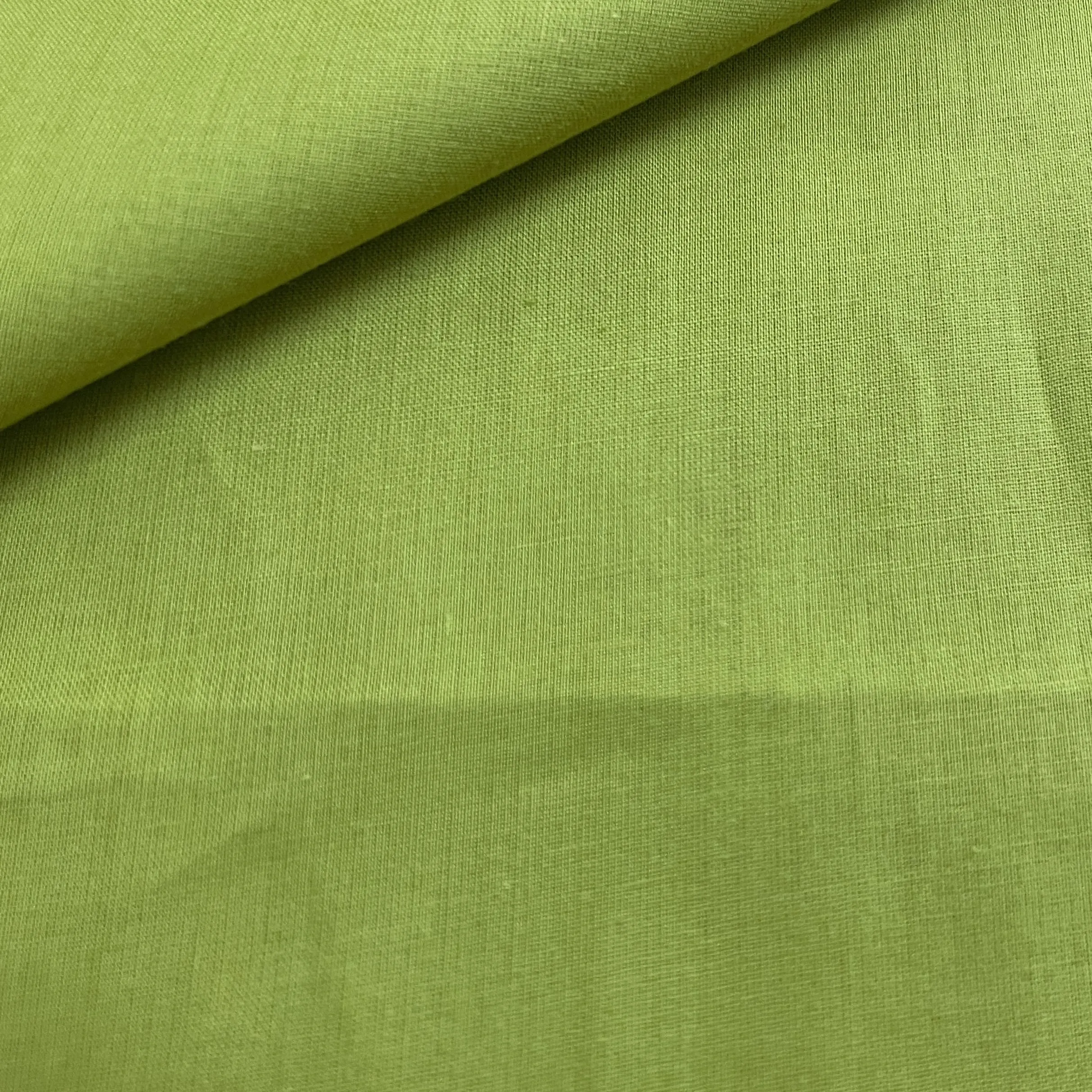 Premium Lemon Green Solid Cotton Mulmul Fabric