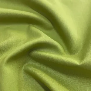 Premium Lemon Green Solid Cotton Mulmul Fabric