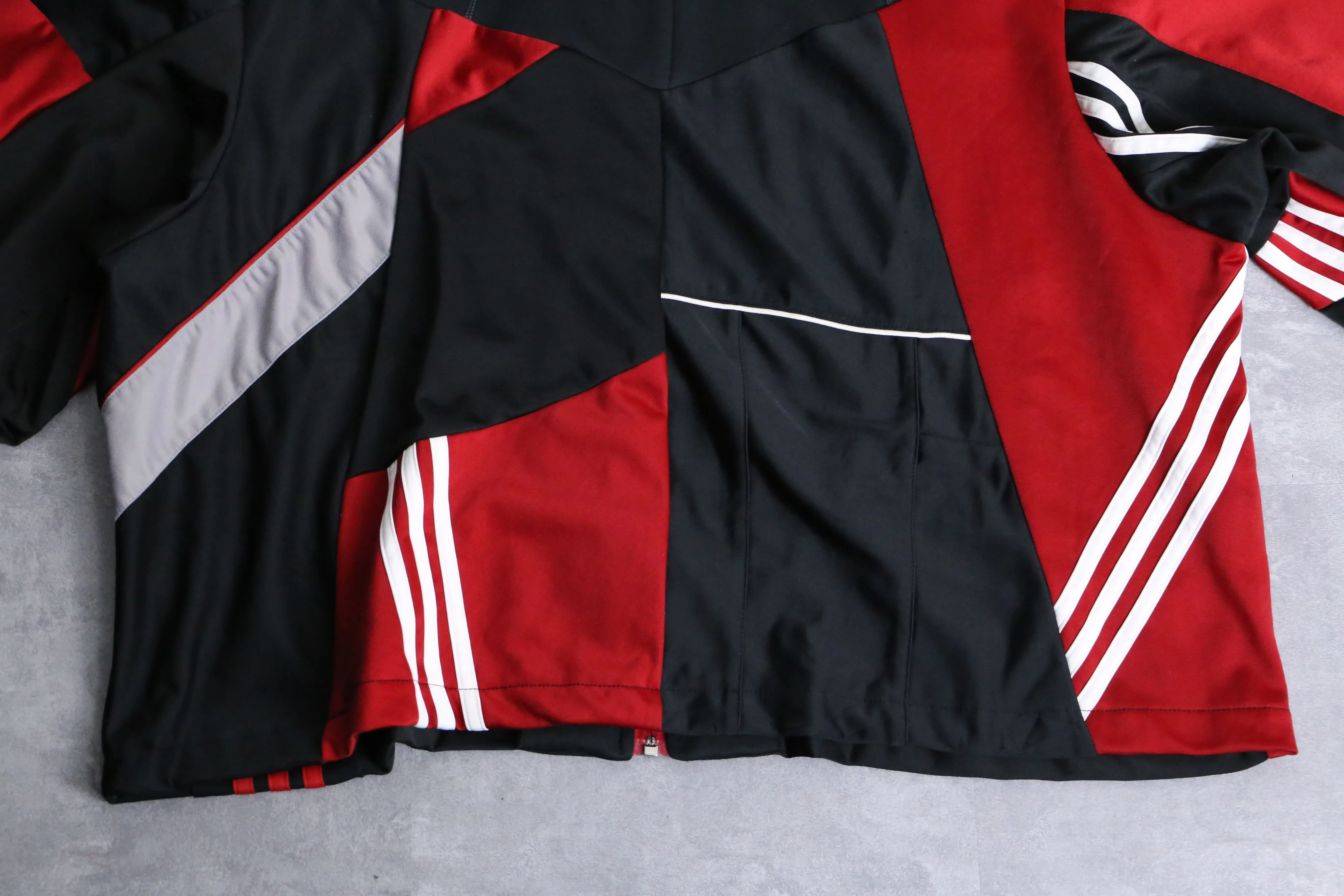 “Re:make” black×red many line track jacket